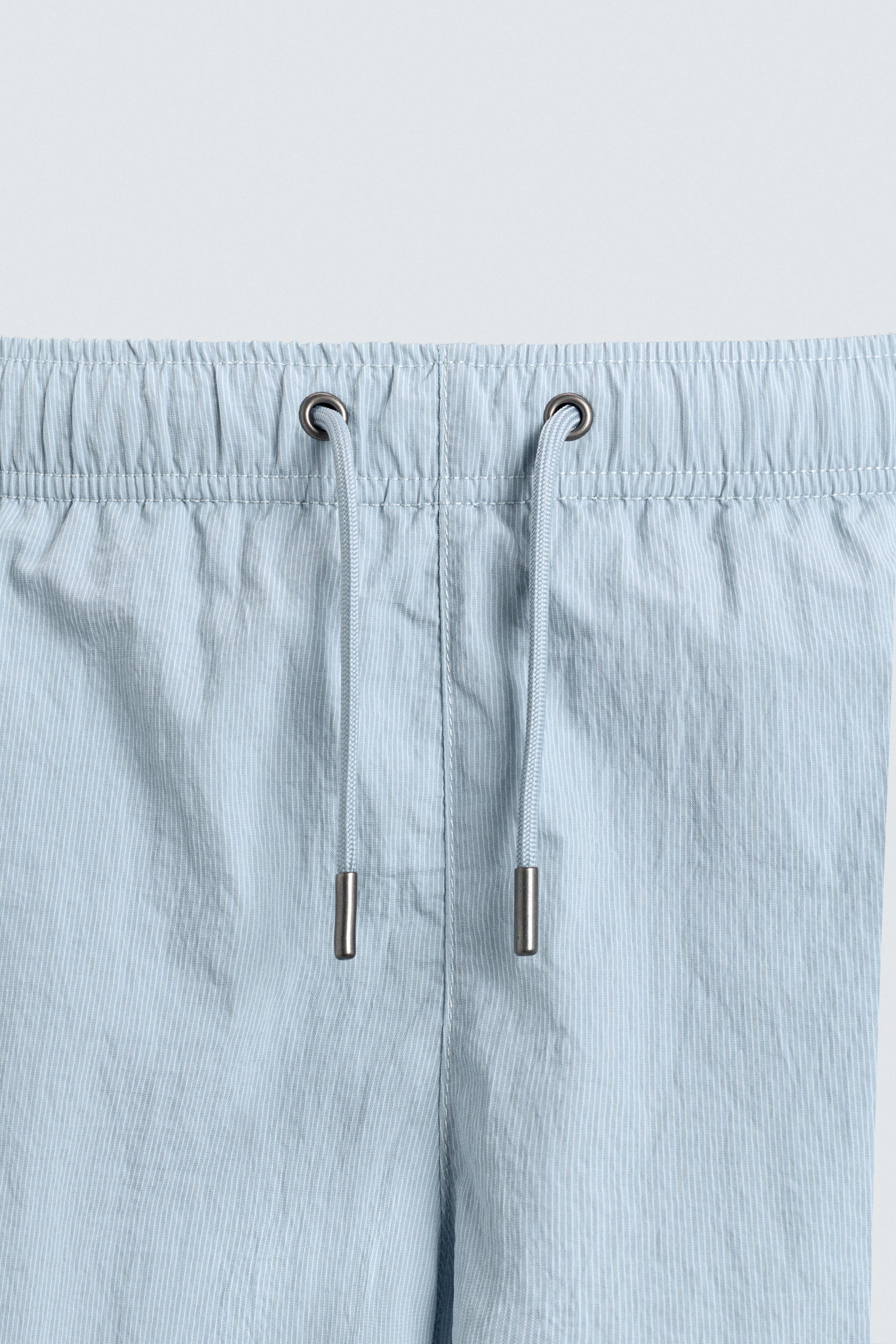 MAILLOT DE BAIN MI-LONG À RAYURES